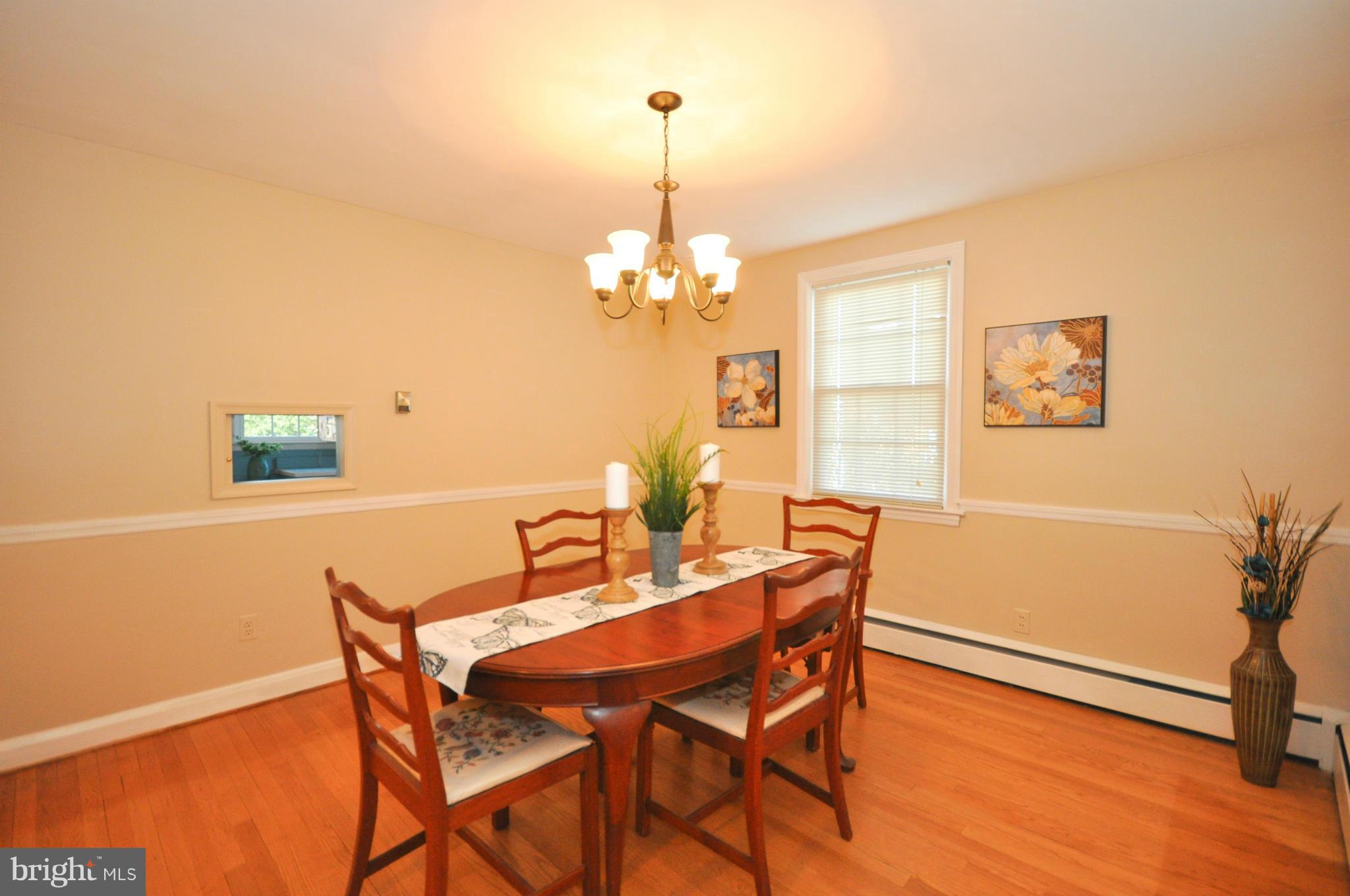 409 Aigburth Road Baltimore, MD 21286 - Photo 9 of 27 a dining room with furniture and window