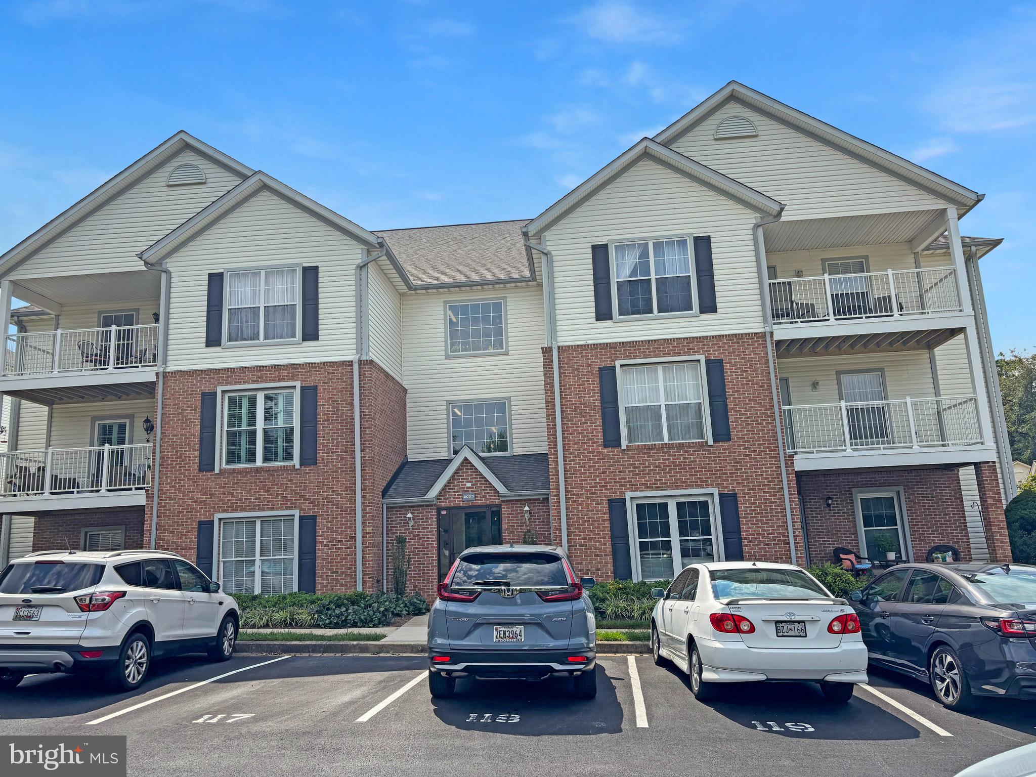 2023 Rudy Serra Drive, Unit 2D Eldersburg, MD 21784 - Photo 1 of 25 a car parked in front of a house