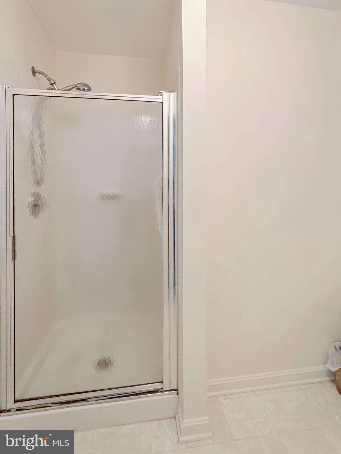 2023 Rudy Serra Drive, Unit 2D Eldersburg, MD 21784 - Photo 13 of 25 a bathroom with a shower