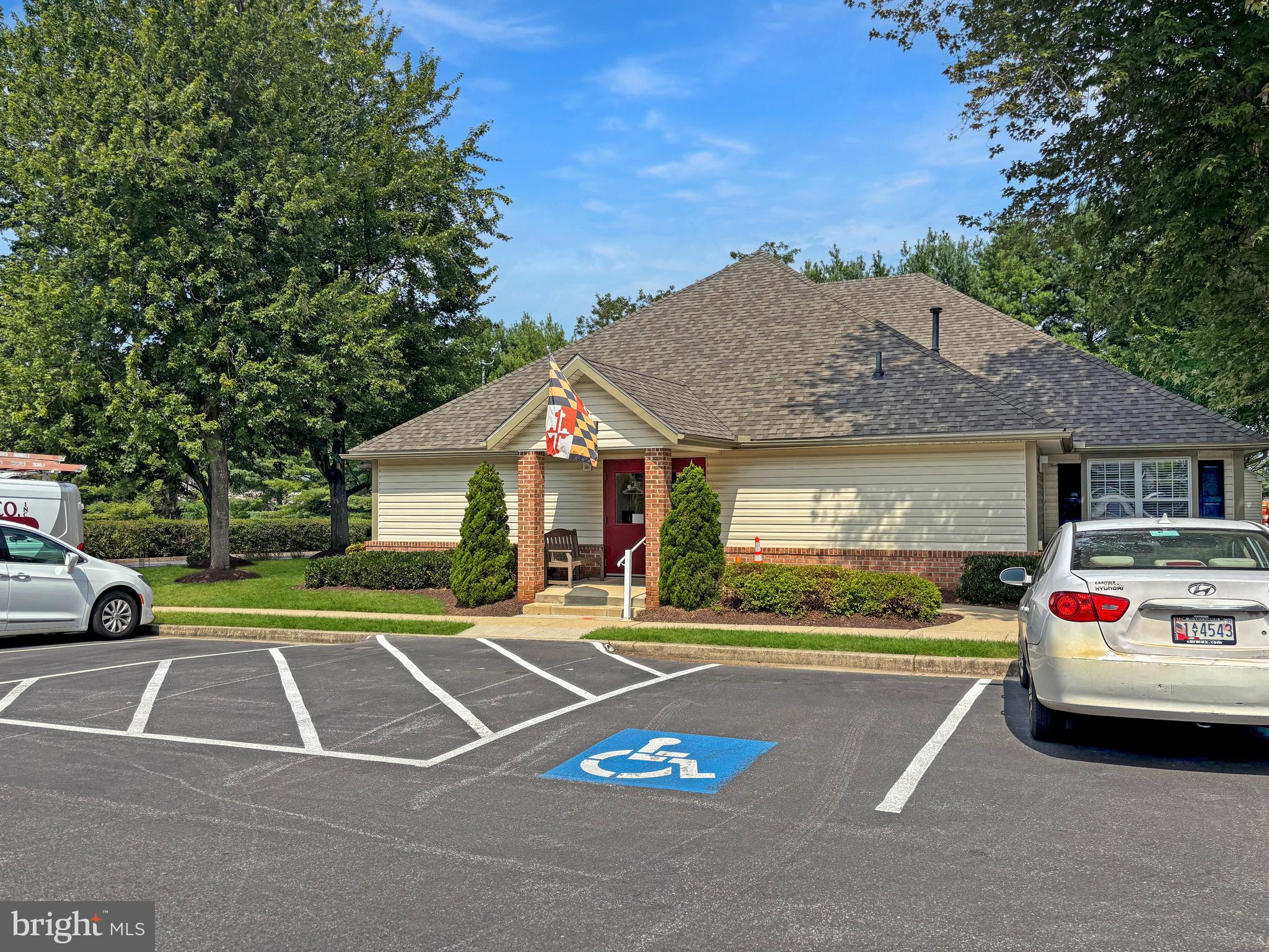 2023 Rudy Serra Drive, Unit 2D Eldersburg, MD 21784 - Photo 21 of 25 a view of a cars park in front of a building