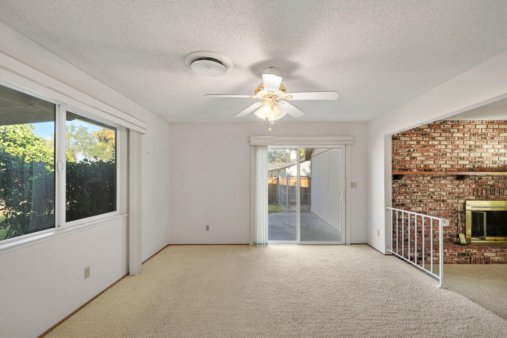 3420 Riverview Drive Redding, CA 96001 - Photo 13 of 40 wooden floor in an empty room with a window