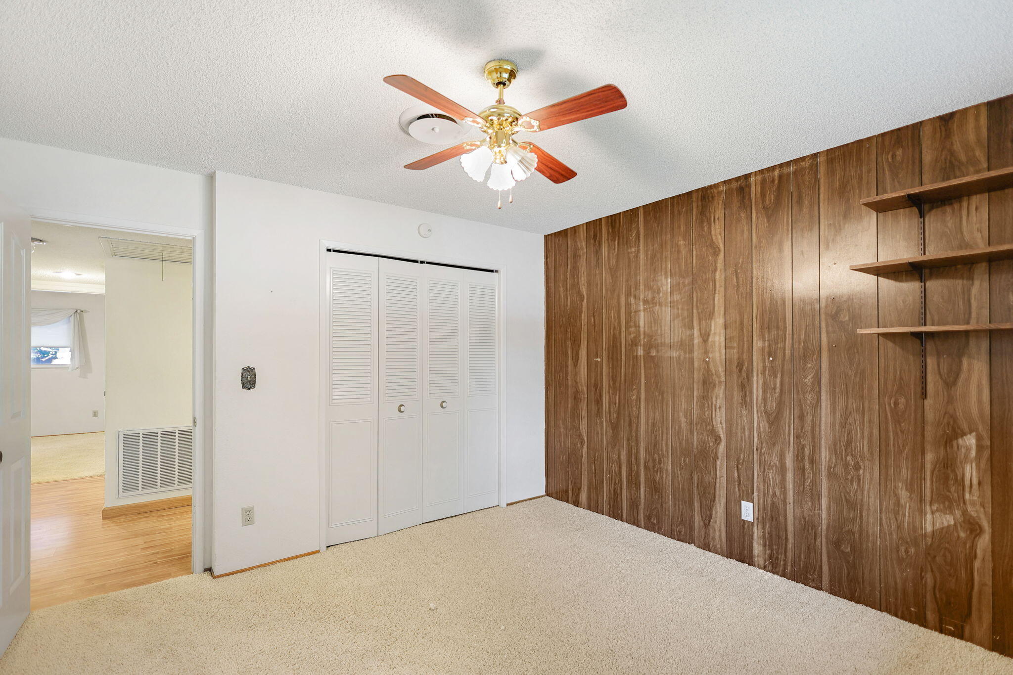3420 Riverview Drive Redding, CA 96001 - Photo 18 of 40 a very nice looking hallway with a chandelier fan