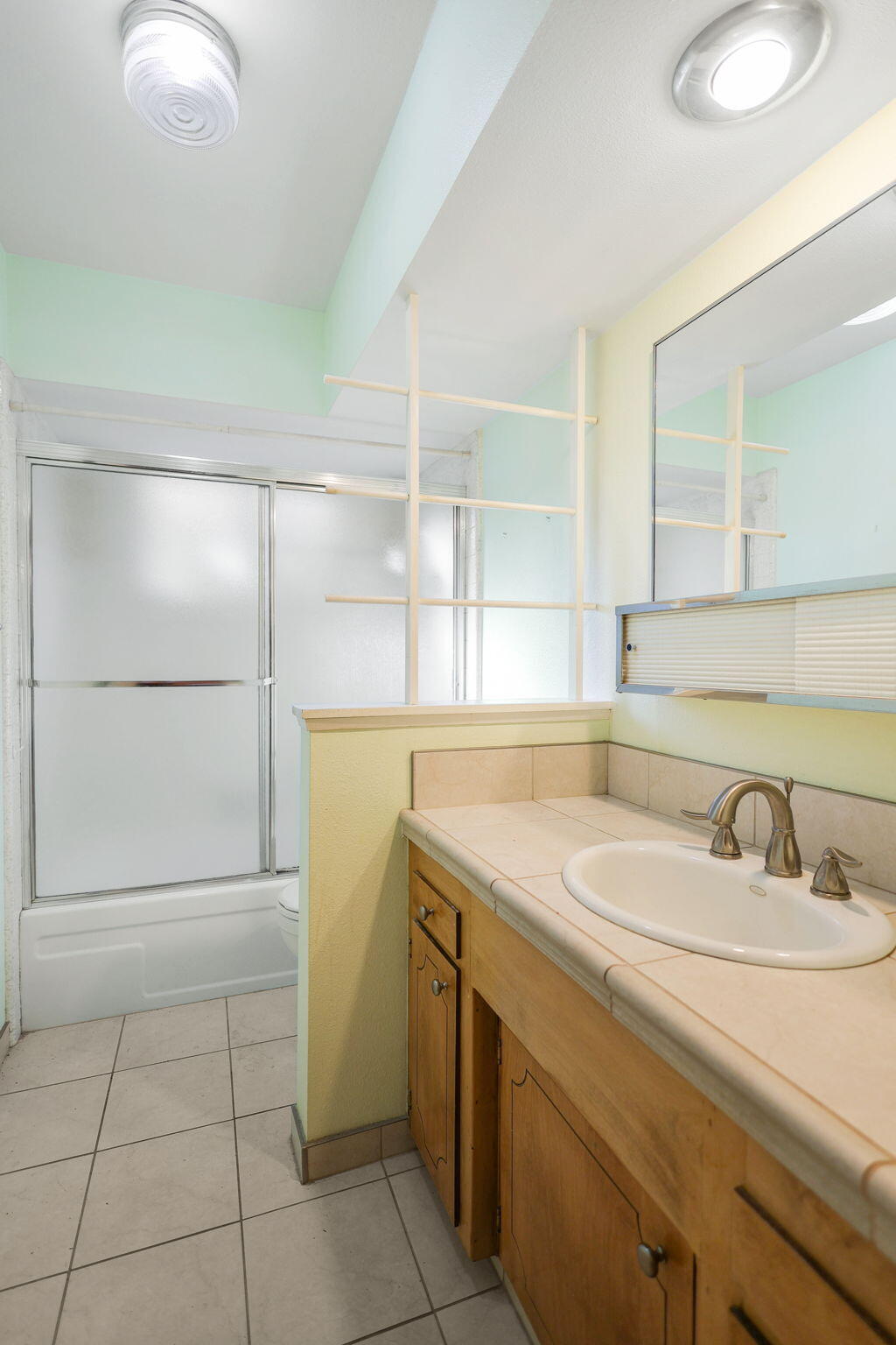 3420 Riverview Drive Redding, CA 96001 - Photo 20 of 40 a bathroom with a sink and a mirror