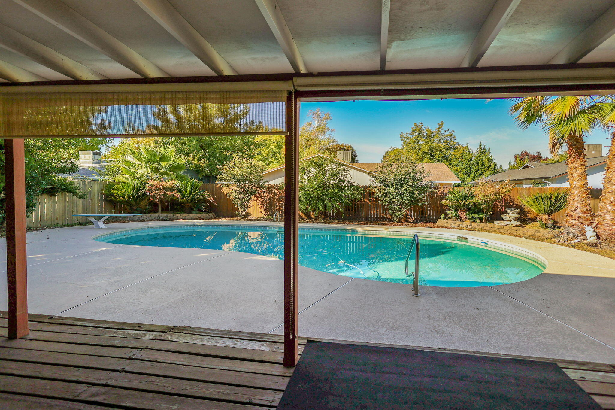 3420 Riverview Drive Redding, CA 96001 - Photo 27 of 40 a view of a porch with a yard