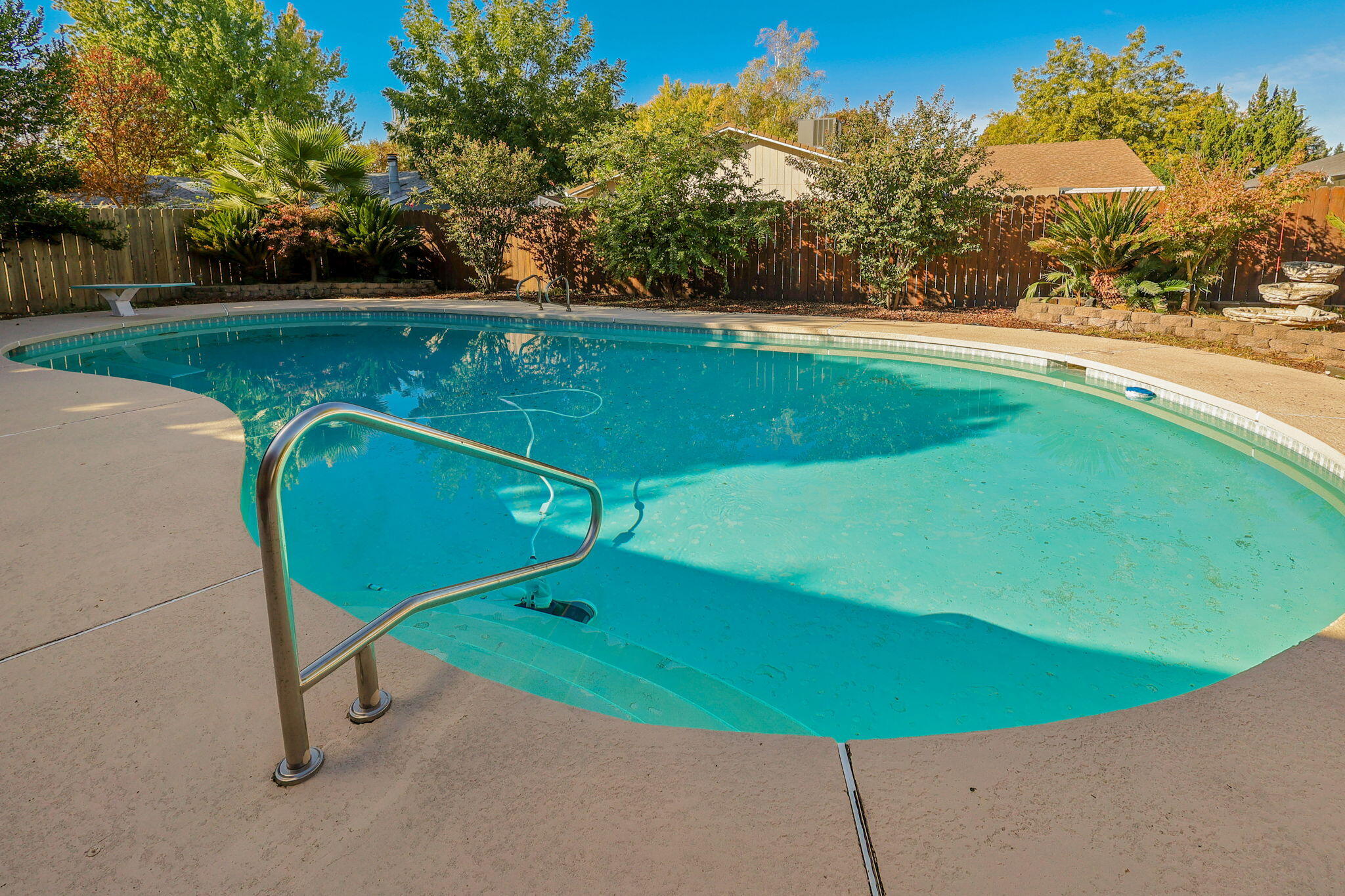3420 Riverview Drive Redding, CA 96001 - Photo 30 of 40 a view of a tennis ground with a small pool