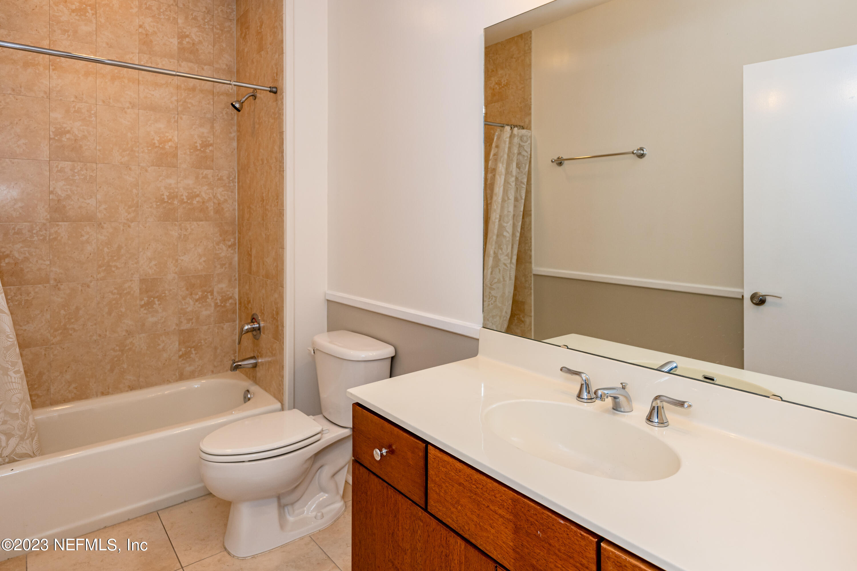 1661 Riverside Avenue, Unit 119 Jacksonville, FL 32204 - Photo 33 of 45 a bathroom with a sink a toilet and shower