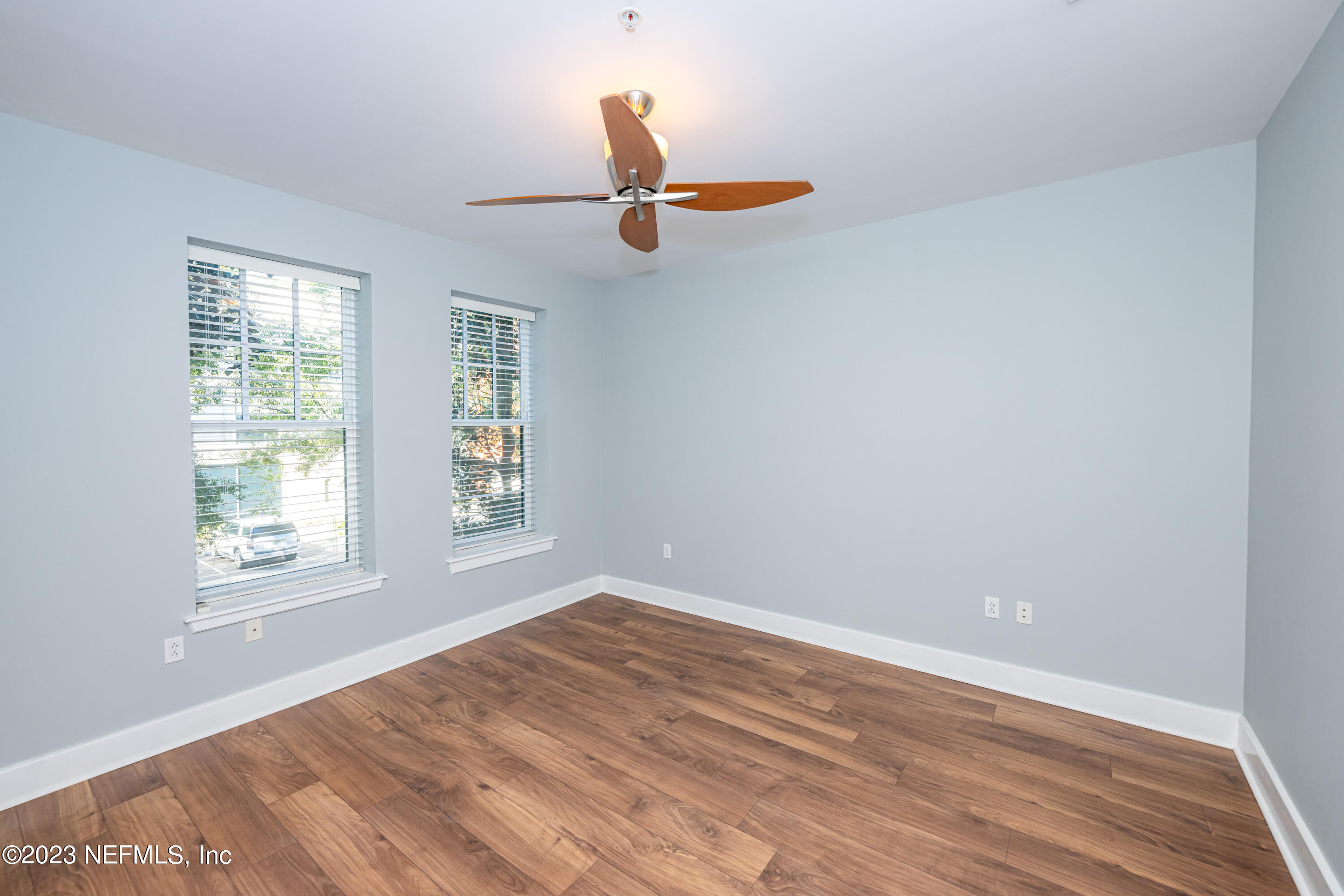 1661 Riverside Avenue, Unit 119 Jacksonville, FL 32204 - Photo 34 of 45 wooden floor in an empty room with a window