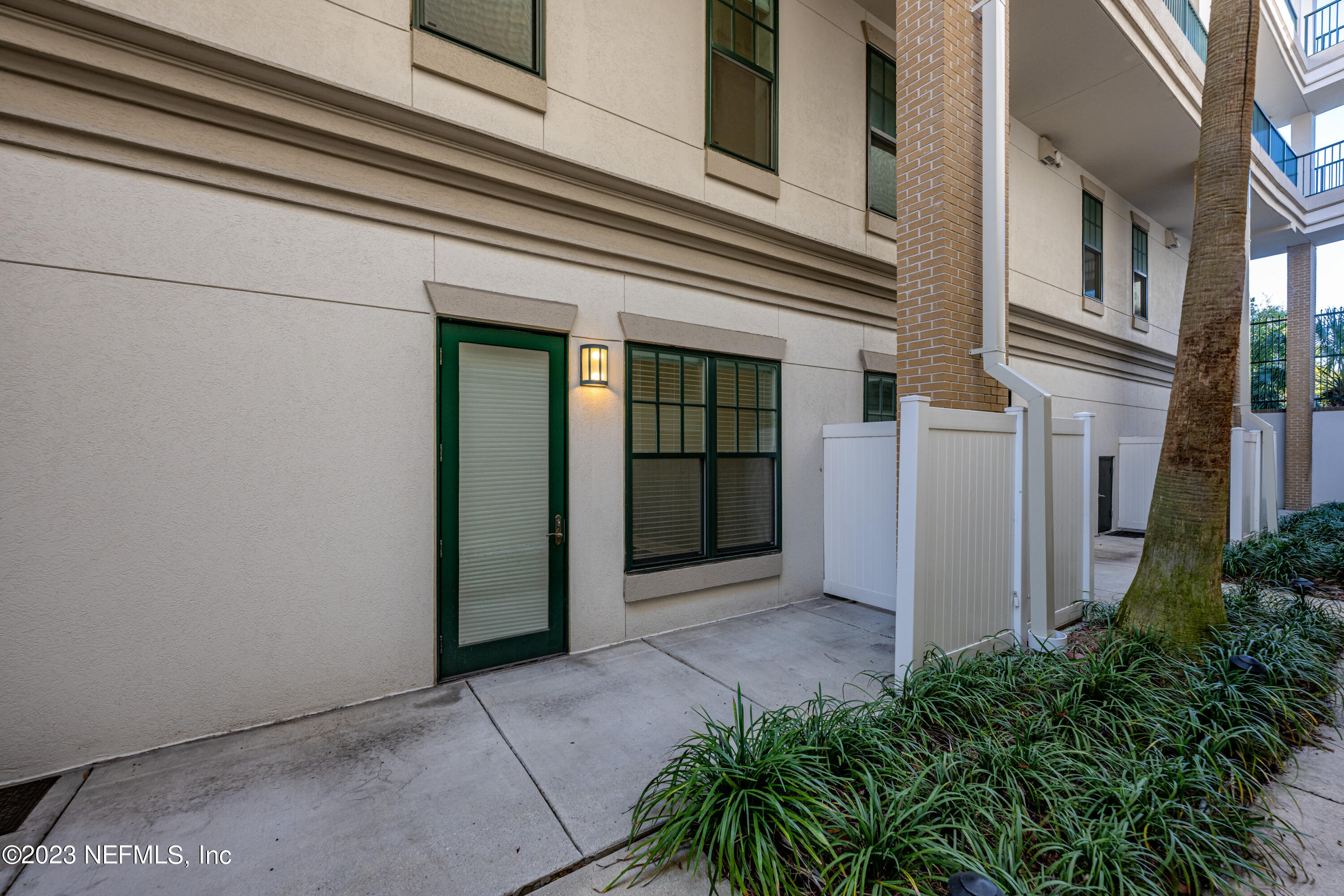 1661 Riverside Avenue, Unit 119 Jacksonville, FL 32204 - Photo 37 of 45 a view of a building terrace with potted plants