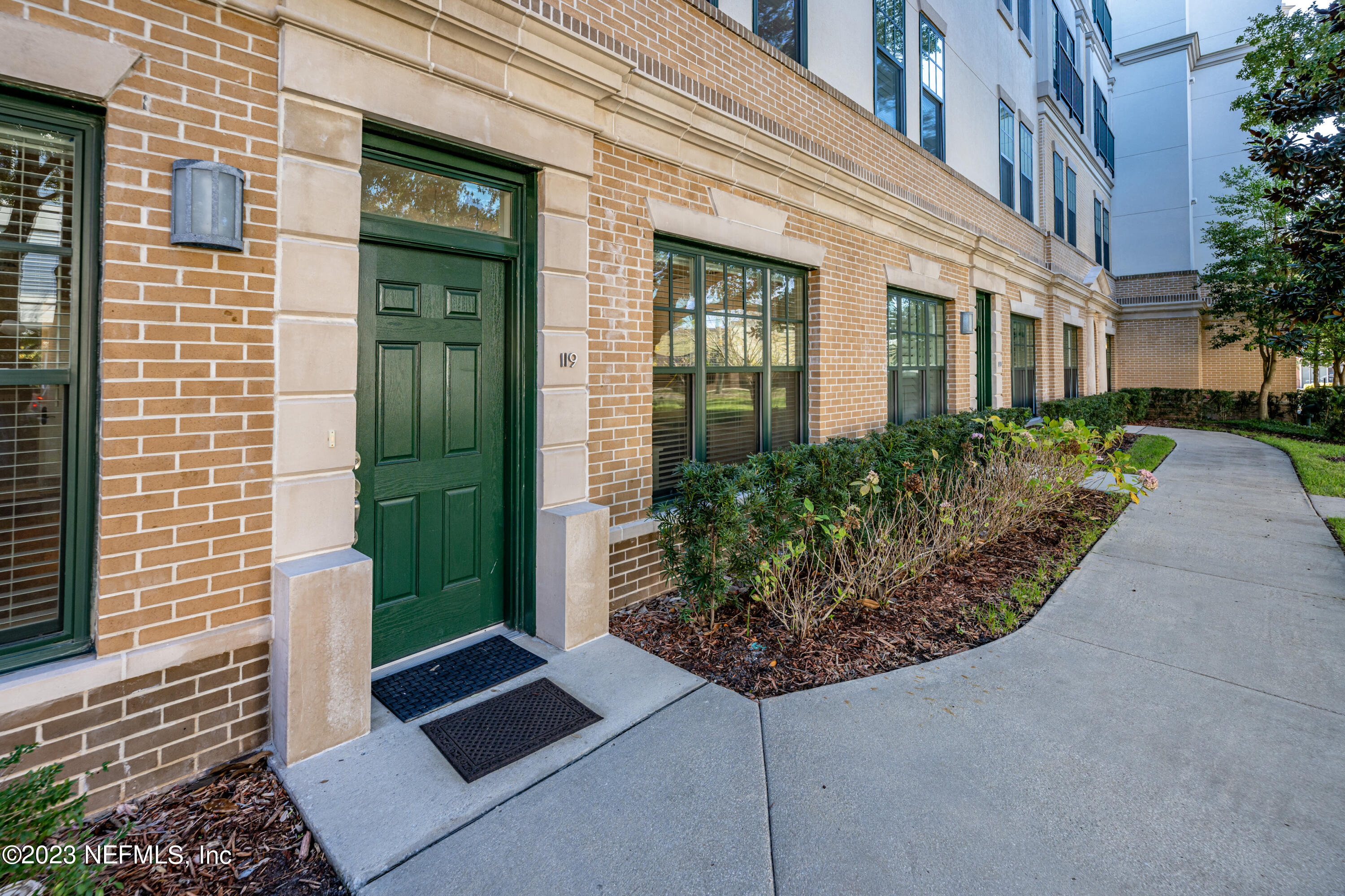 1661 Riverside Avenue, Unit 119 Jacksonville, FL 32204 - Photo 5 of 45 a view of a garden with pathway