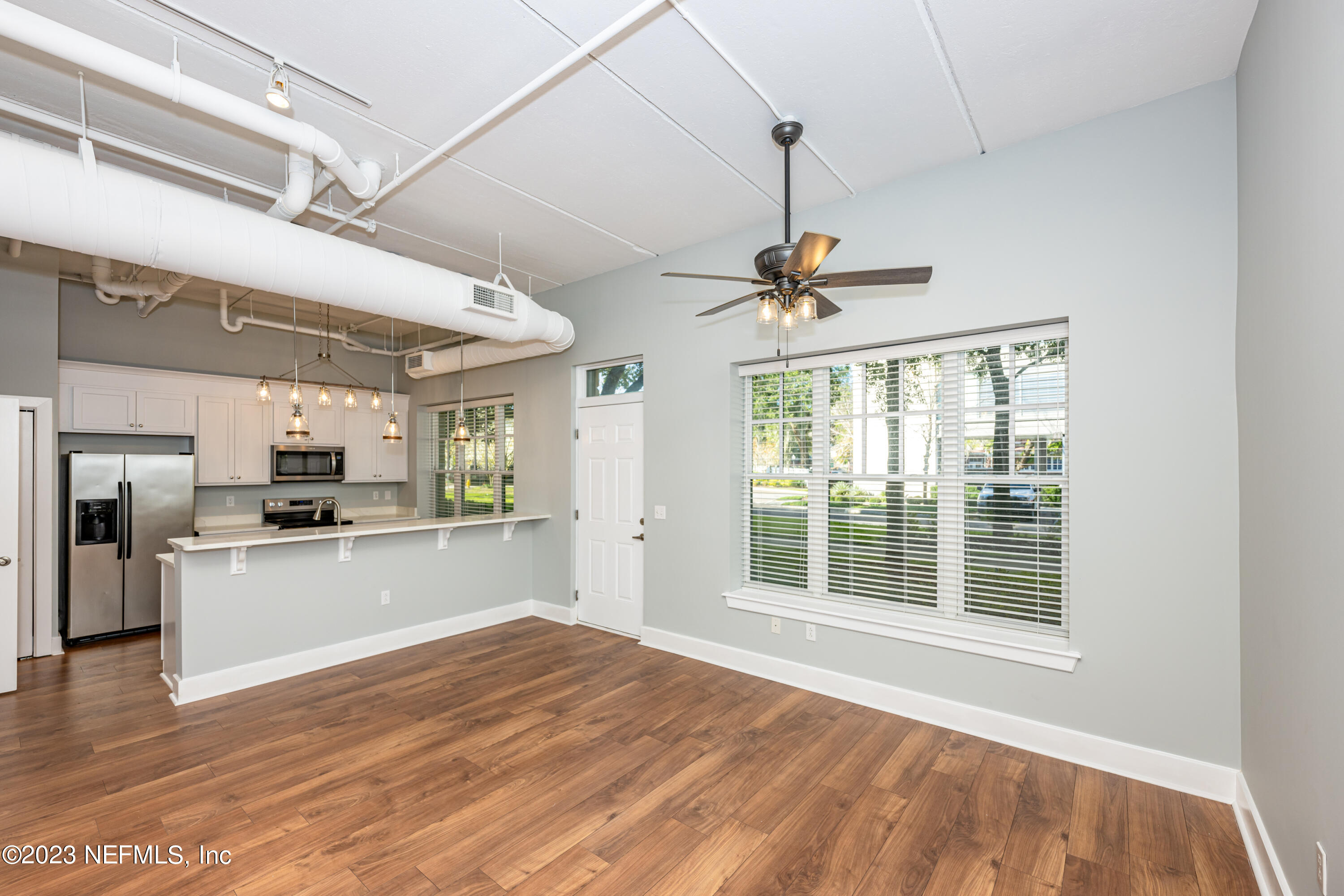 1661 Riverside Avenue, Unit 119 Jacksonville, FL 32204 - Photo 6 of 45 a open kitchen with cabinets a sink and appliances