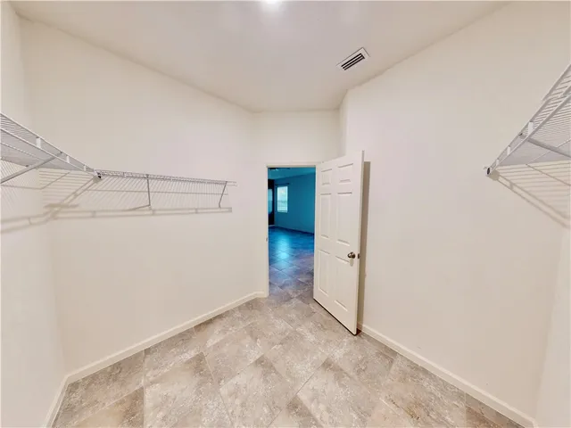 a view of a room with an empty space