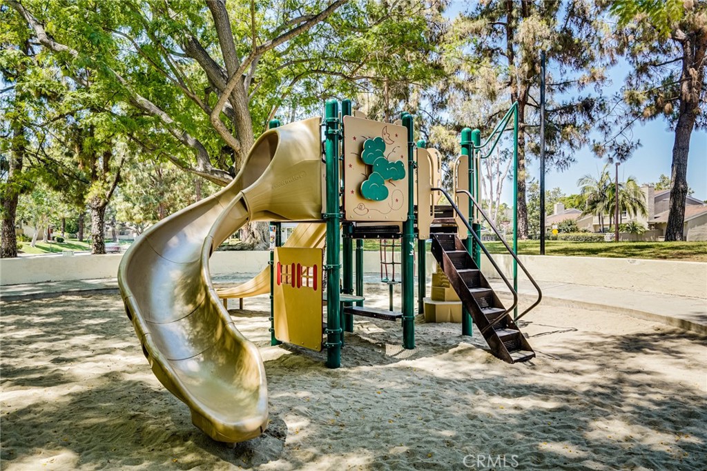 49 East Yale Loop, Unit 26 Irvine, CA 92604 - Photo 58 of 63 a view of a slide with a slide