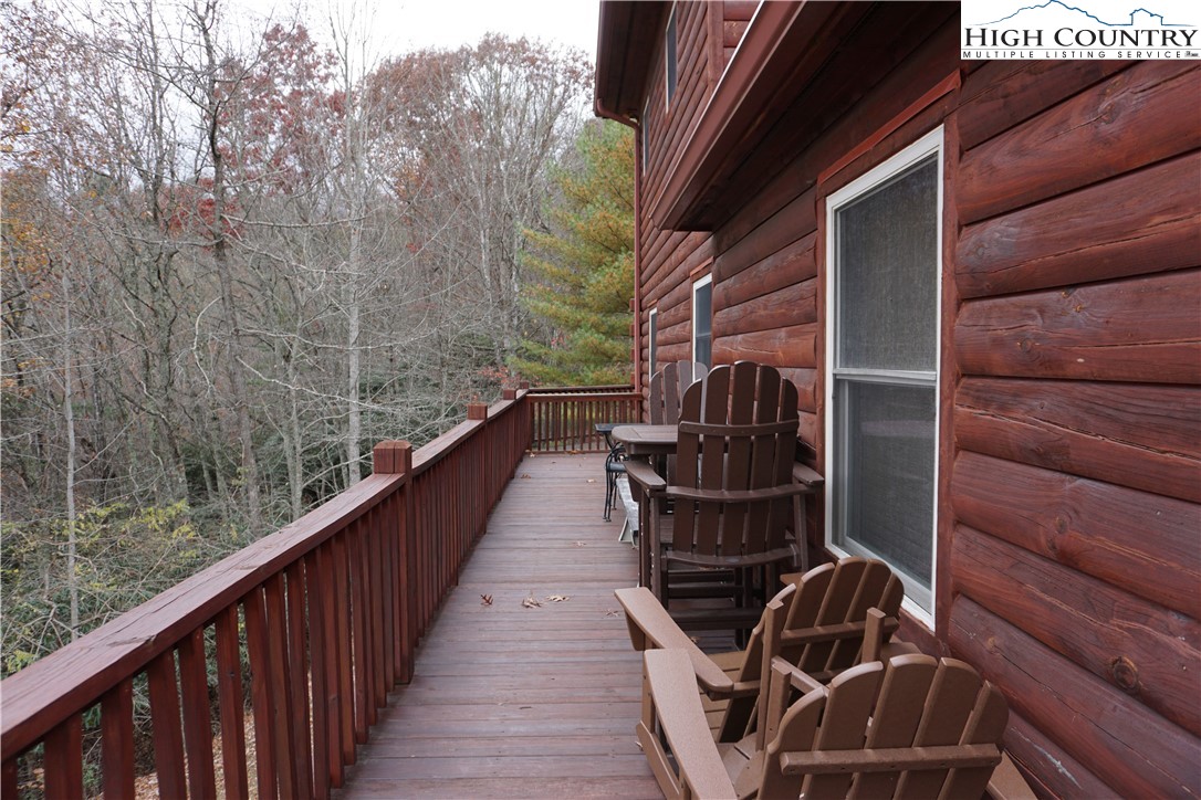 182 Buckland Road Grassy Creek, NC 28631 - Photo 33 of 38 a view of balcony with wooden floor and fence
