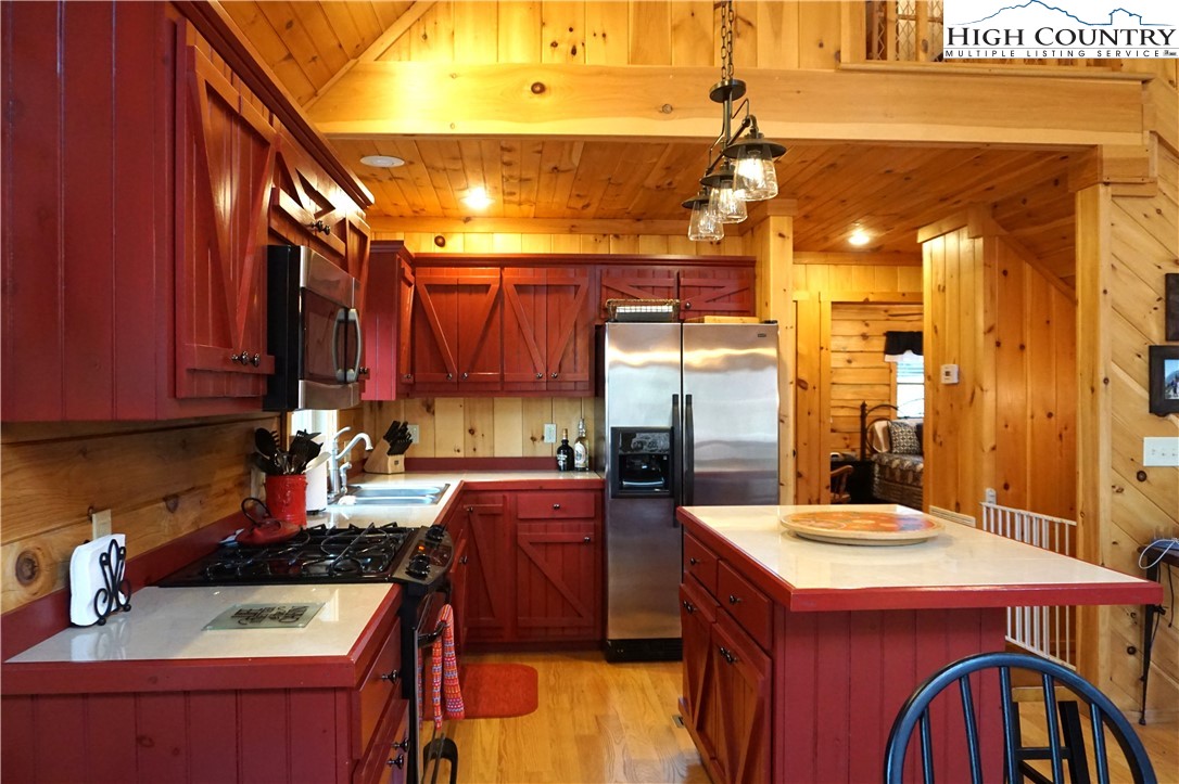 182 Buckland Road Grassy Creek, NC 28631 - Photo 8 of 38 a kitchen with a sink and cabinets
