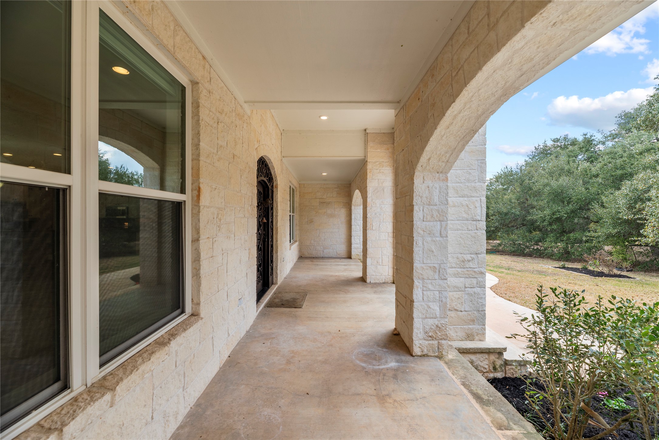 2051 Hillview Road Bellville, TX 77418 - Photo 12 of 47 Extended covered patio on the front of the home.