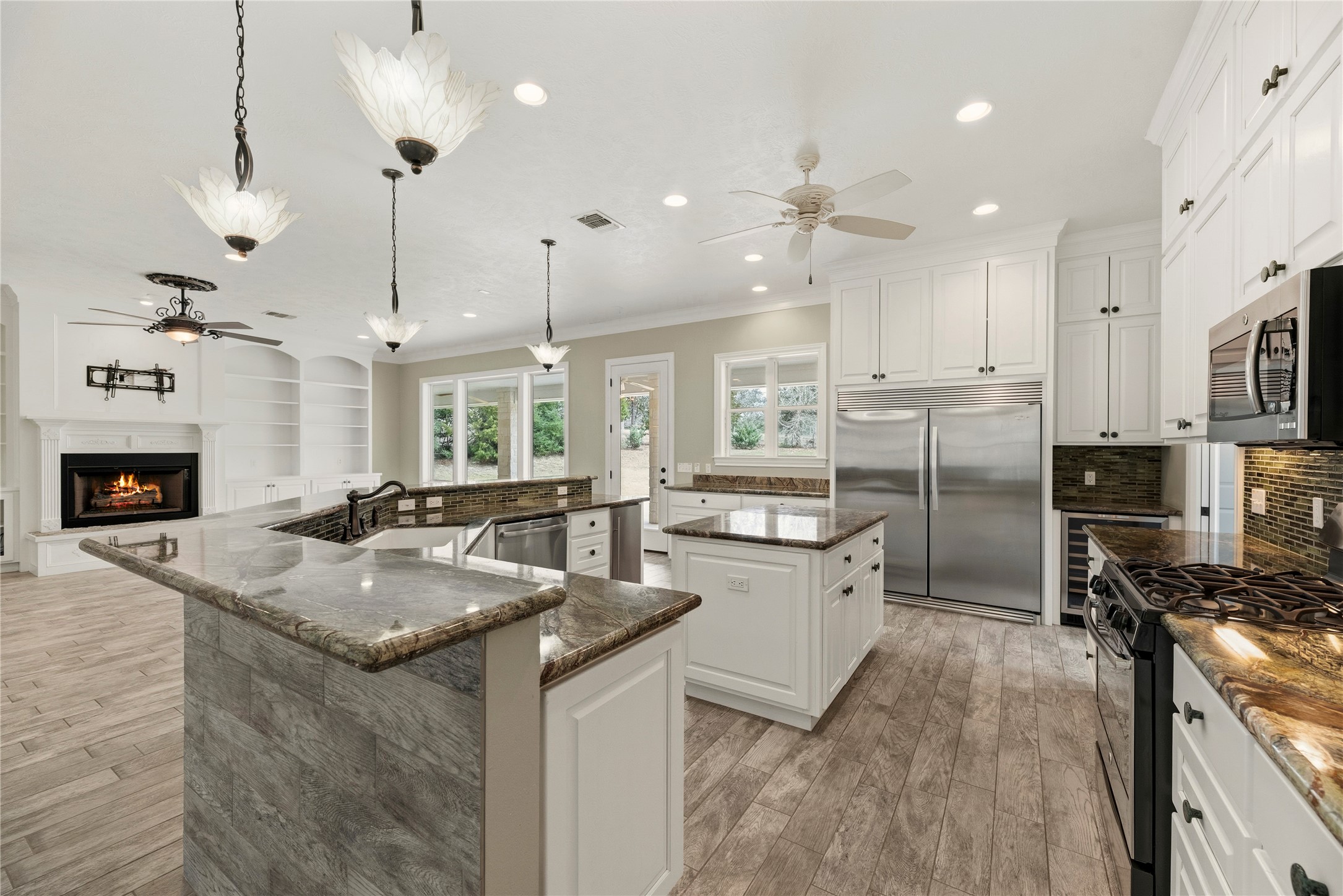 2051 Hillview Road Bellville, TX 77418 - Photo 17 of 47 Side-by-side refrigerator/freezer, separate ice maker and wine fridge included!