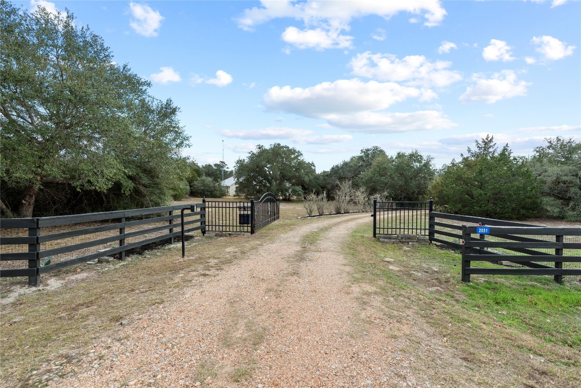2051 Hillview Road Bellville, TX 77418 - Photo 2 of 47 Automatic driveway gate.