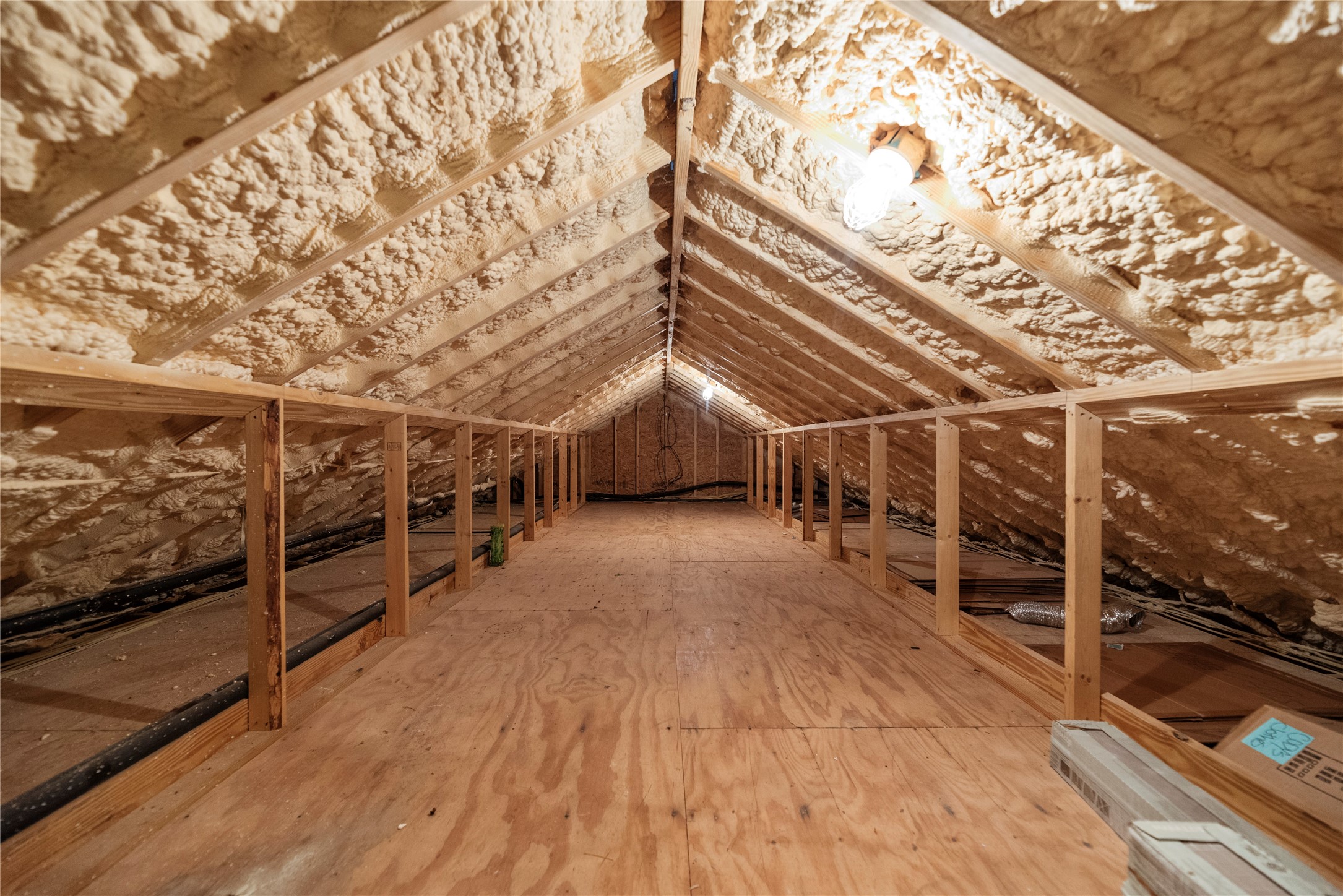 2051 Hillview Road Bellville, TX 77418 - Photo 30 of 47 Large climate-controlled attic with stairs and a handrail.