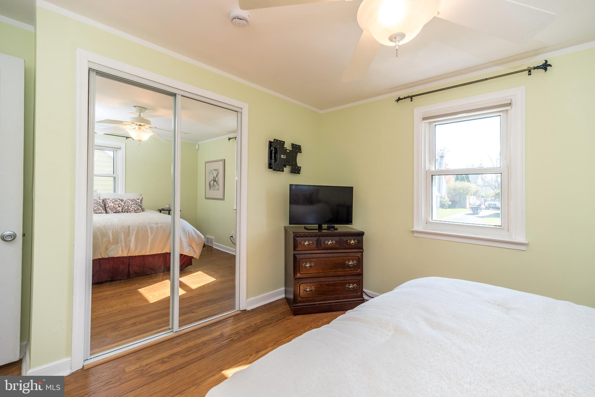26 Shirley Road Hatboro, PA 19040 - Photo 25 of 50 a bedroom with furniture and a flat screen tv