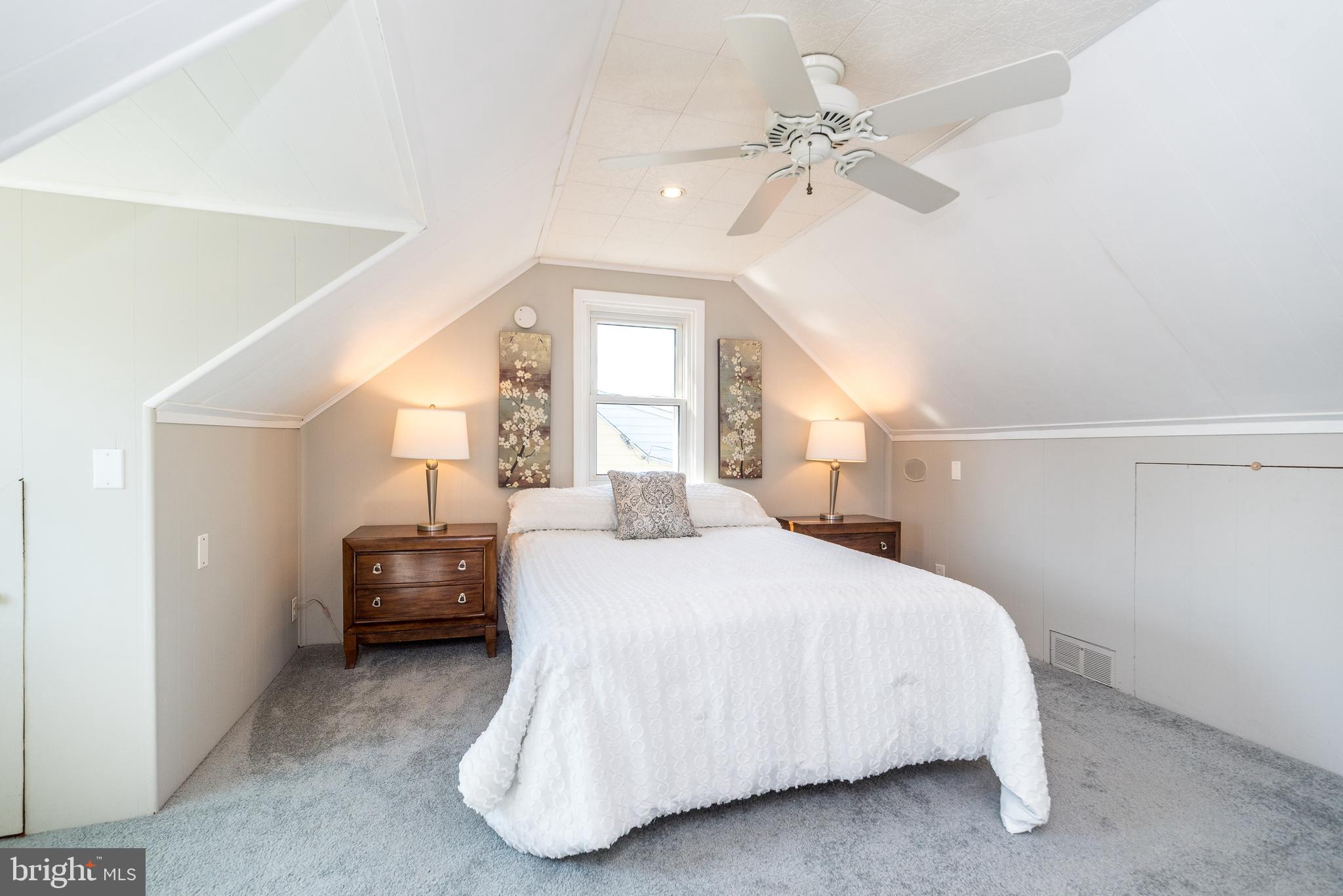 26 Shirley Road Hatboro, PA 19040 - Photo 28 of 50 a bedroom with a bed window and a ceiling fan
