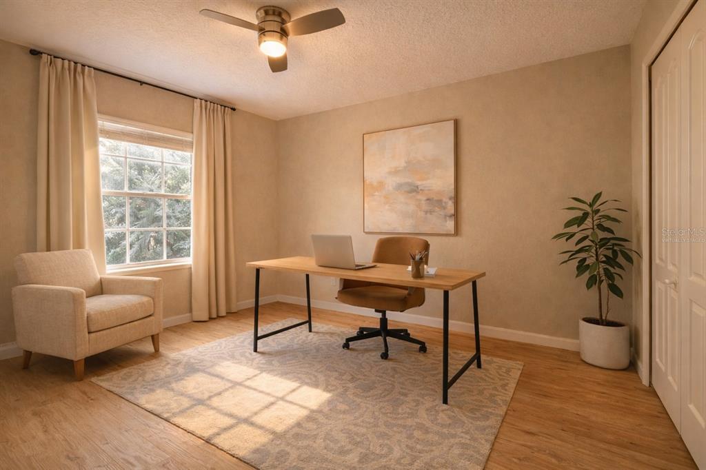 709 Fortanini Circle Ocoee, FL 34761 - Photo 11 of 22 a living room with furniture and a window
