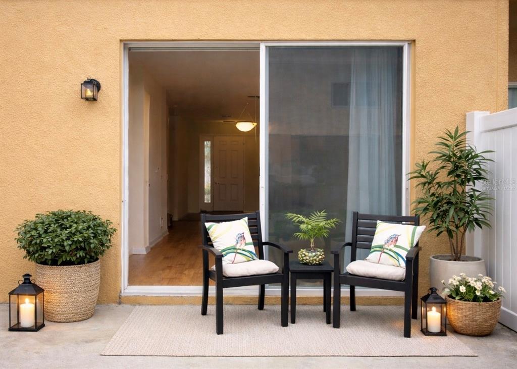 709 Fortanini Circle Ocoee, FL 34761 - Photo 12 of 22 a view of a house with backyard and sitting area