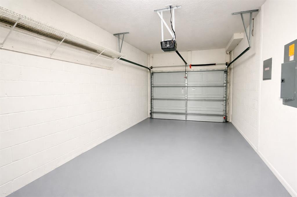 709 Fortanini Circle Ocoee, FL 34761 - Photo 13 of 22 a view of walk in closet with empty racks
