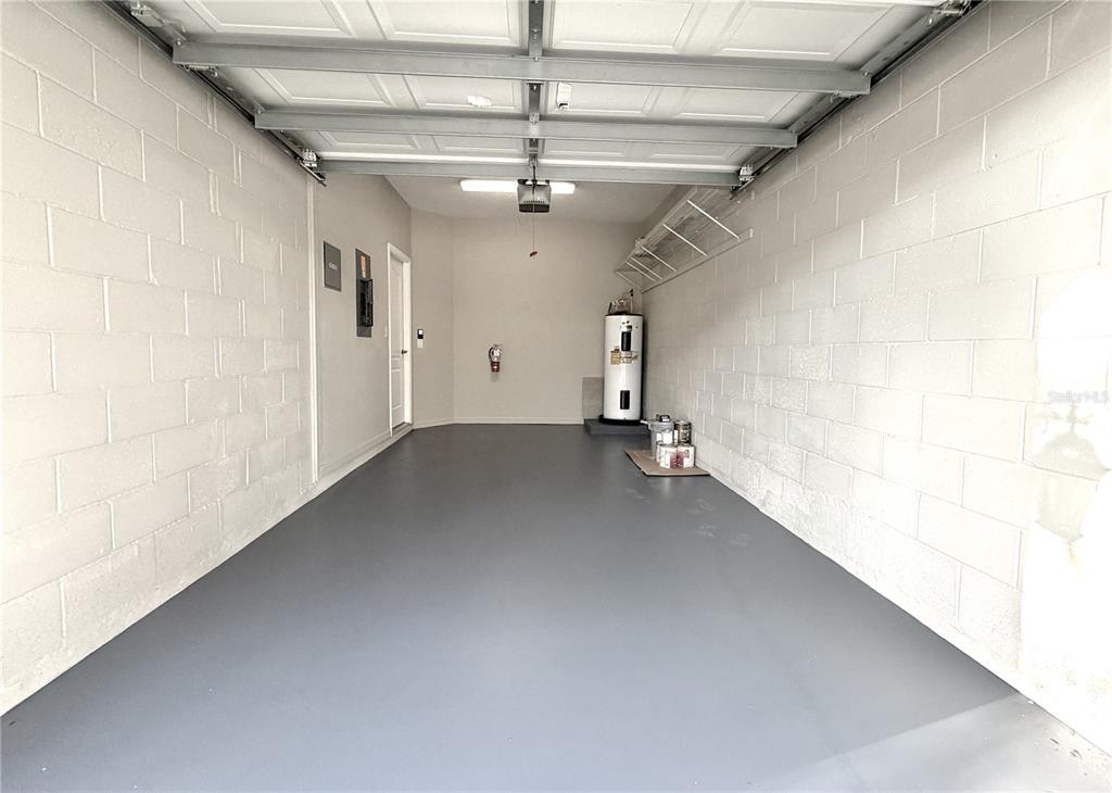 709 Fortanini Circle Ocoee, FL 34761 - Photo 14 of 22 a view of a big room with a ceiling fan