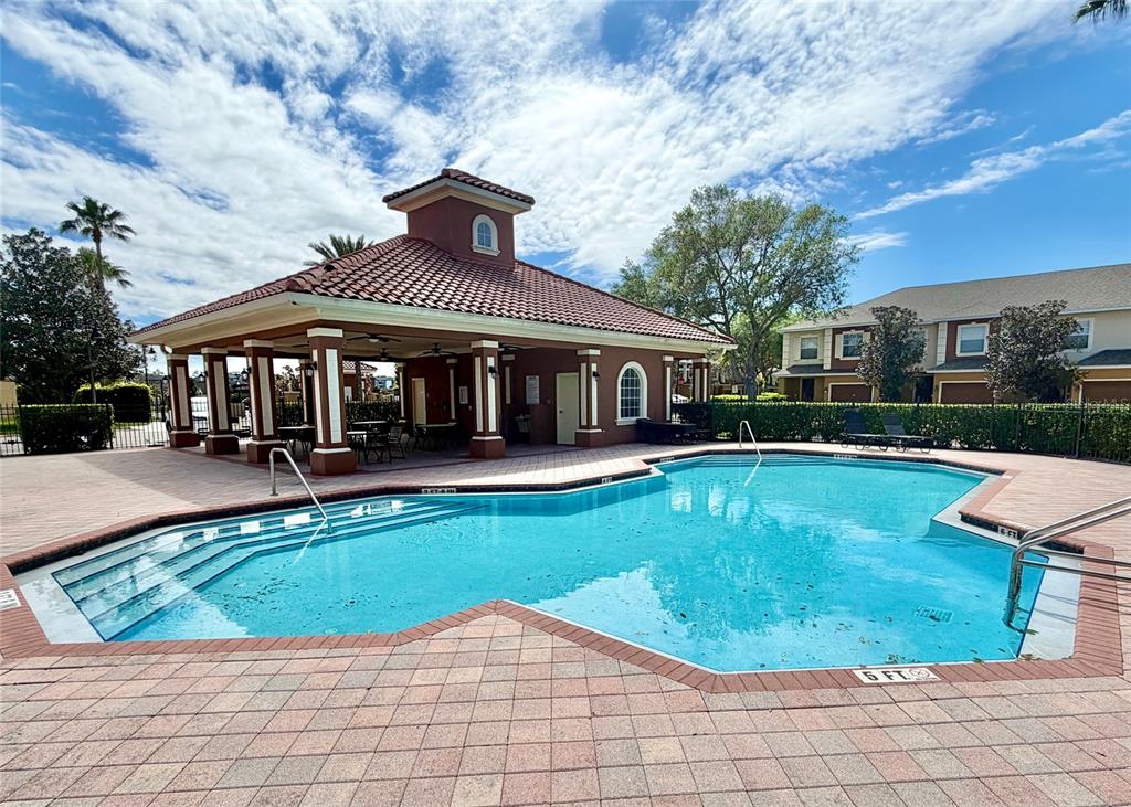 709 Fortanini Circle Ocoee, FL 34761 - Photo 19 of 22 a view of a house with swimming pool