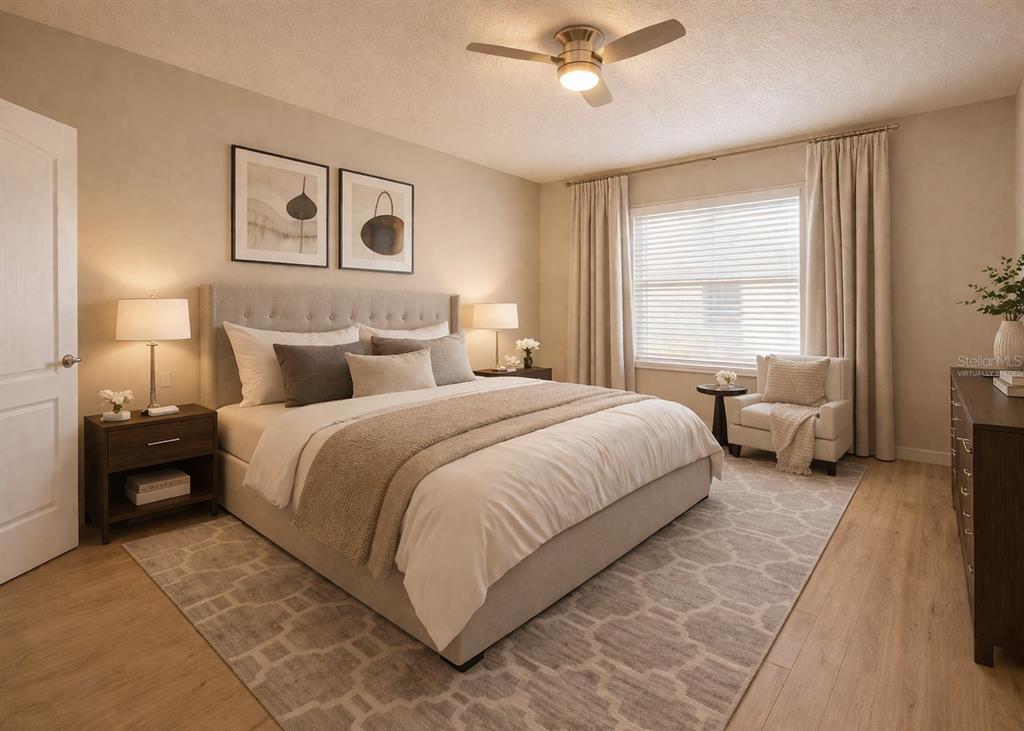 709 Fortanini Circle Ocoee, FL 34761 - Photo 5 of 22 a bedroom with a bed couch and window