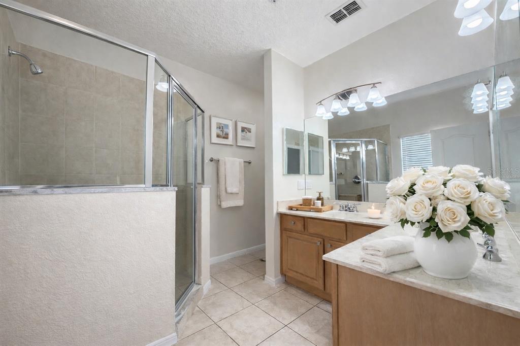 709 Fortanini Circle Ocoee, FL 34761 - Photo 7 of 22 a kitchen with stainless steel appliances a sink stove and refrigerator