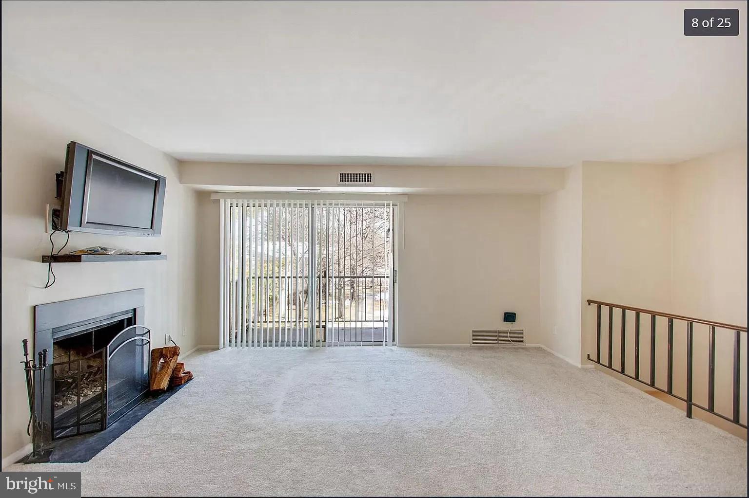 450 Old Forge Crossing, Unit 450 Devon, PA 19333 - Photo 2 of 16 a view of livingroom with furniture and a fireplace