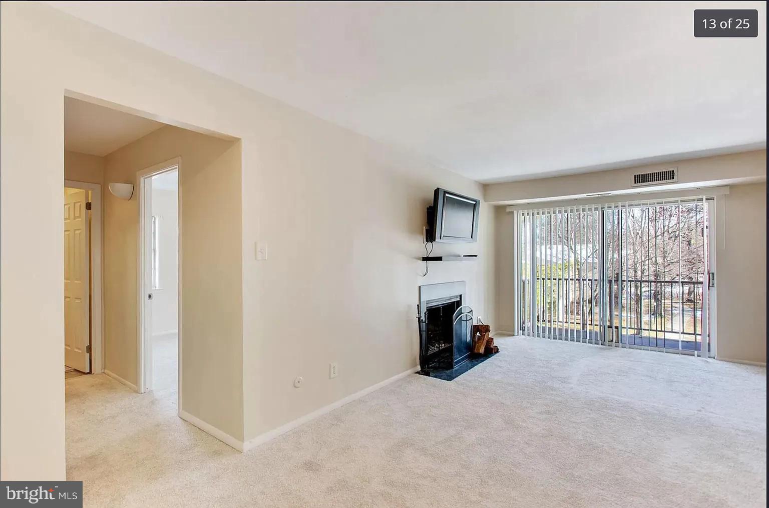 450 Old Forge Crossing, Unit 450 Devon, PA 19333 - Photo 3 of 16 a view of livingroom with furniture and fireplace