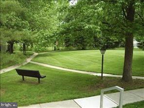 450 Old Forge Crossing, Unit 450 Devon, PA 19333 - Photo 7 of 16 a view of a park with large trees