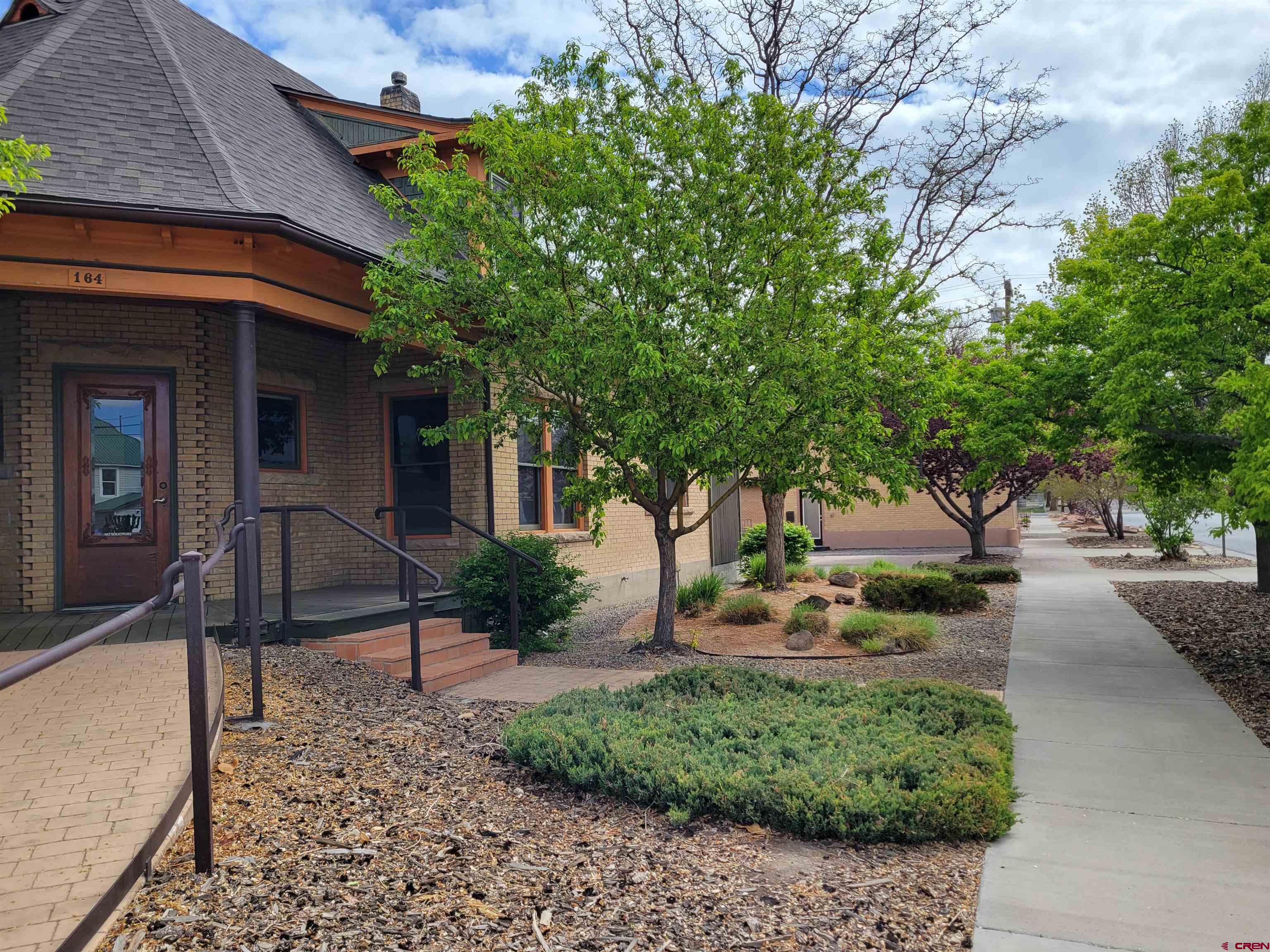 164 Meeker Street Delta, CO 81416 - Photo 1 of 1 a house view with a garden space