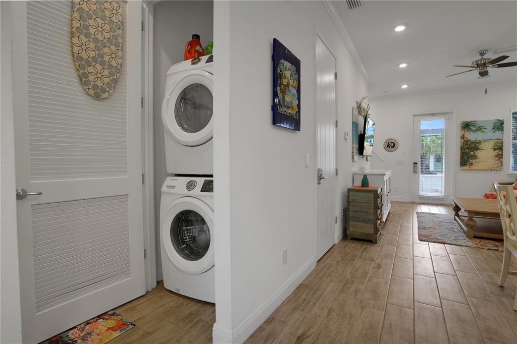 3083 Key Lime Loop Kissimmee, FL 34747 - Photo 20 of 82 a living room with furniture and a wooden floor