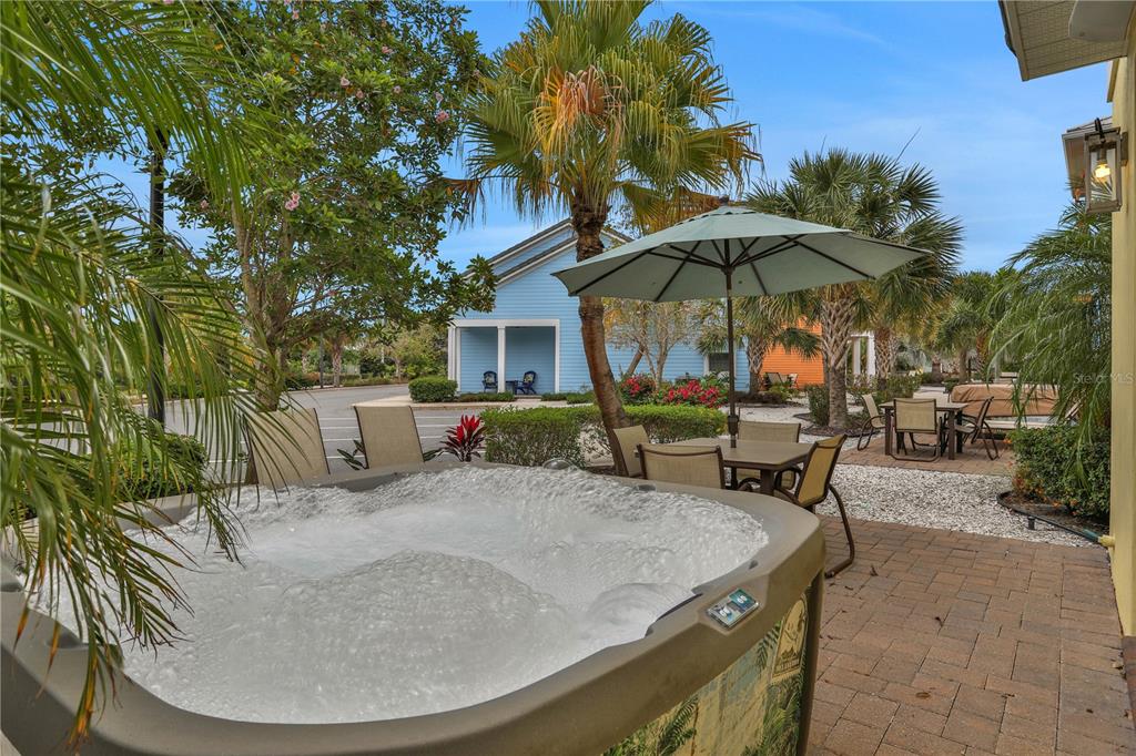 3083 Key Lime Loop Kissimmee, FL 34747 - Photo 3 of 82 an outdoor space with furniture and umbrella