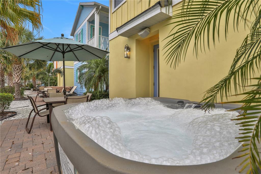 3083 Key Lime Loop Kissimmee, FL 34747 - Photo 33 of 82 a backyard of a house with table and chairs