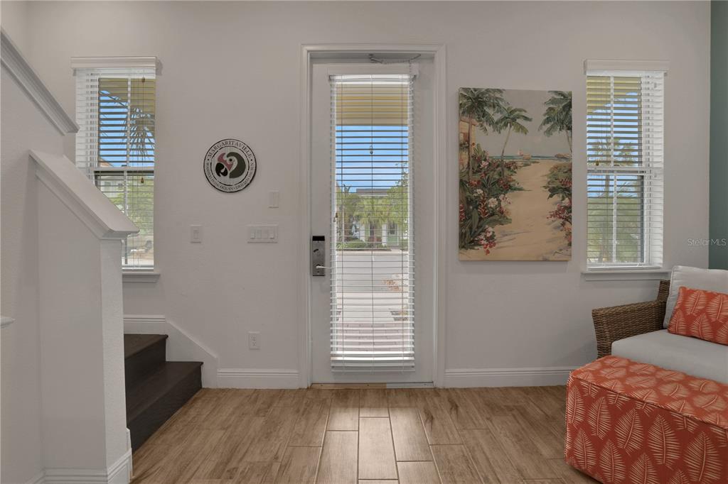 3083 Key Lime Loop Kissimmee, FL 34747 - Photo 8 of 82 a view of room with window and wooden floor