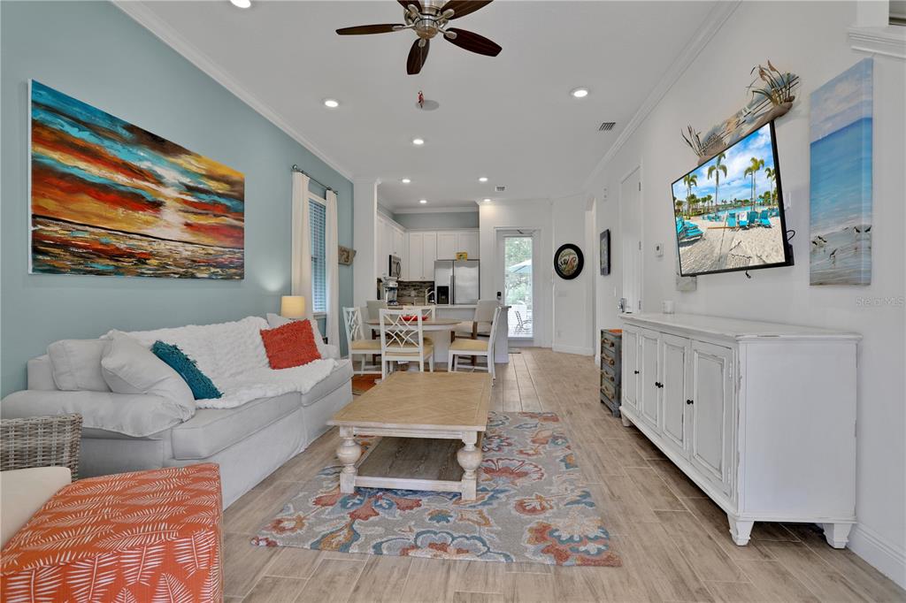 3083 Key Lime Loop Kissimmee, FL 34747 - Photo 9 of 82 a living room with furniture and a flat screen tv