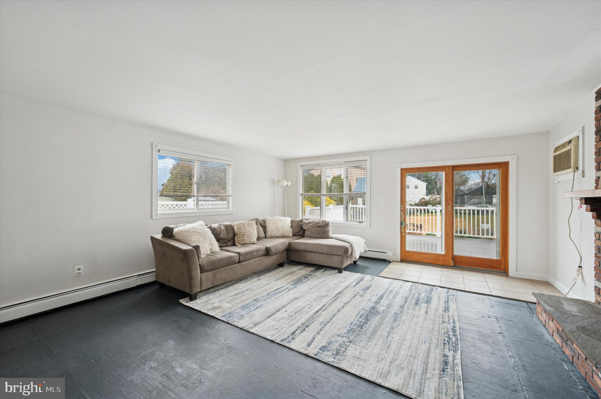 42 Colonial Road Havertown, PA 19083 - Photo 11 of 27 a living room with furniture and a window