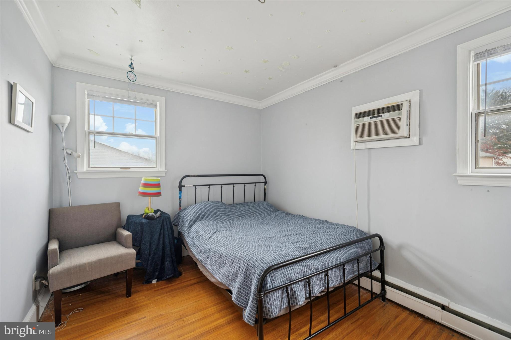 42 Colonial Road Havertown, PA 19083 - Photo 16 of 27 a bedroom with a bed and a couch