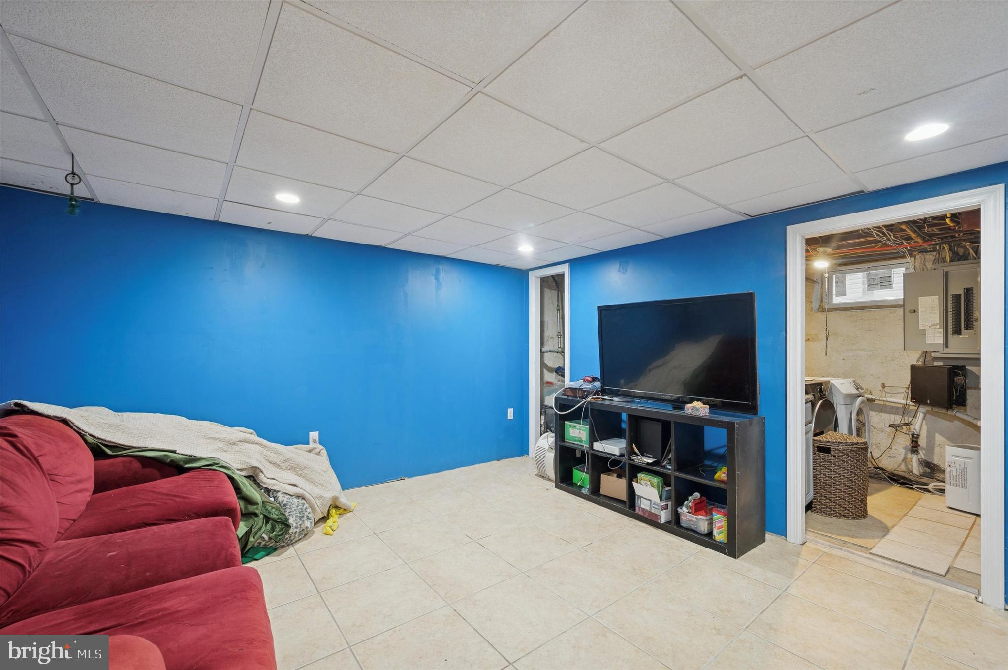 42 Colonial Road Havertown, PA 19083 - Photo 21 of 27 a bed room with a bed and a flat screen tv