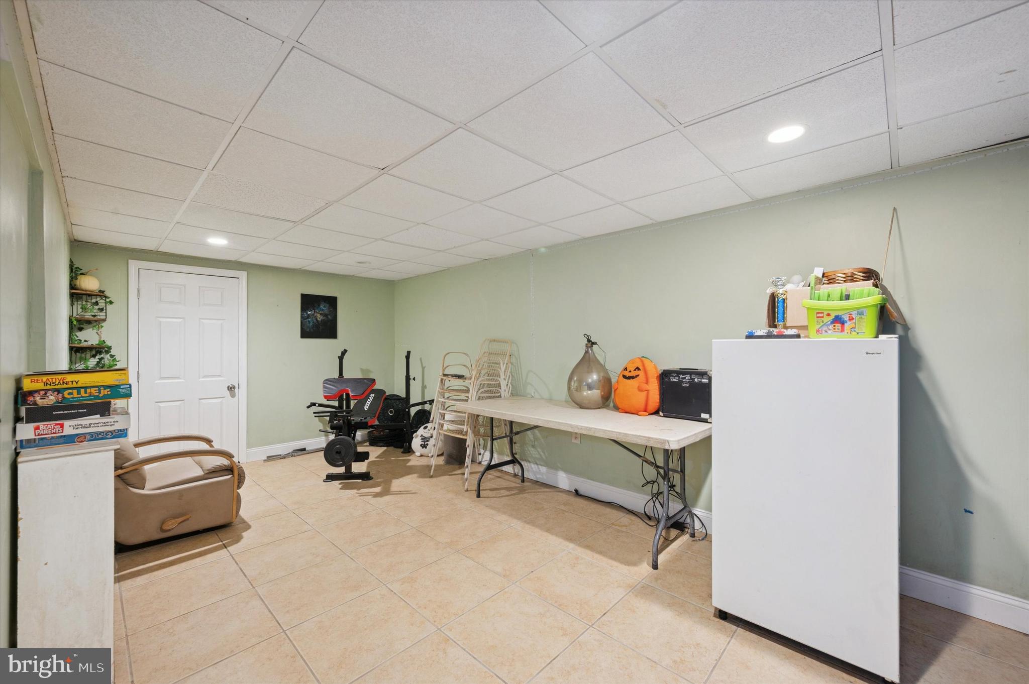 42 Colonial Road Havertown, PA 19083 - Photo 22 of 27 a living room with furniture and a gym equipment