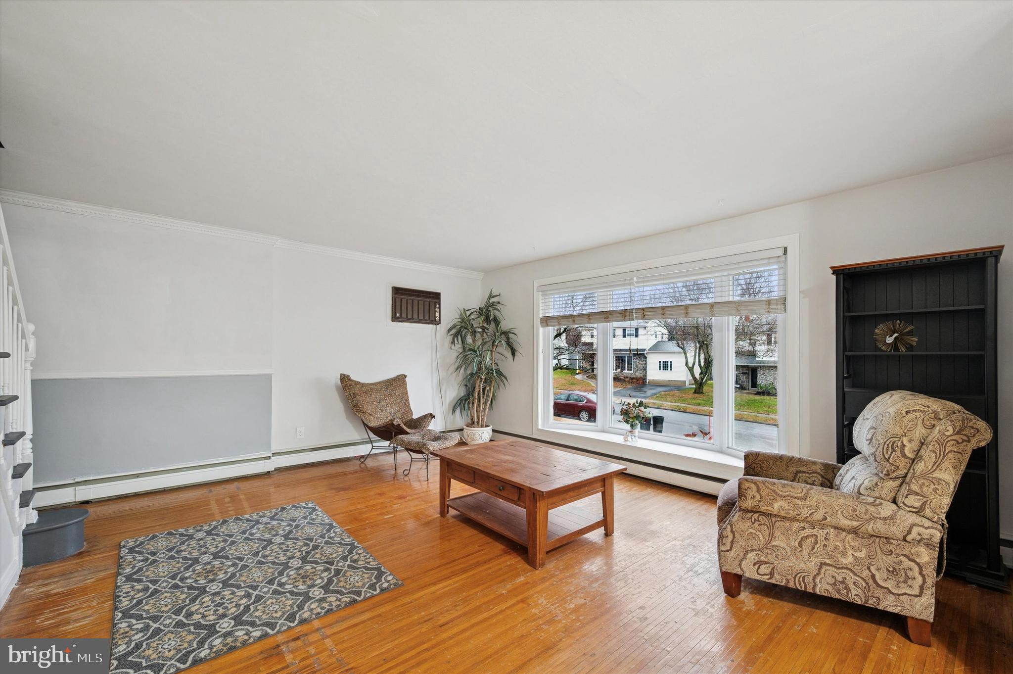 42 Colonial Road Havertown, PA 19083 - Photo 3 of 27 a living room with furniture and a rug