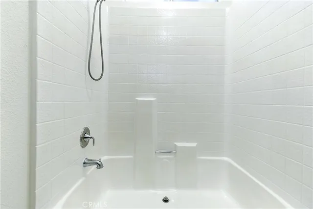 a potted plant sitting in front of a door