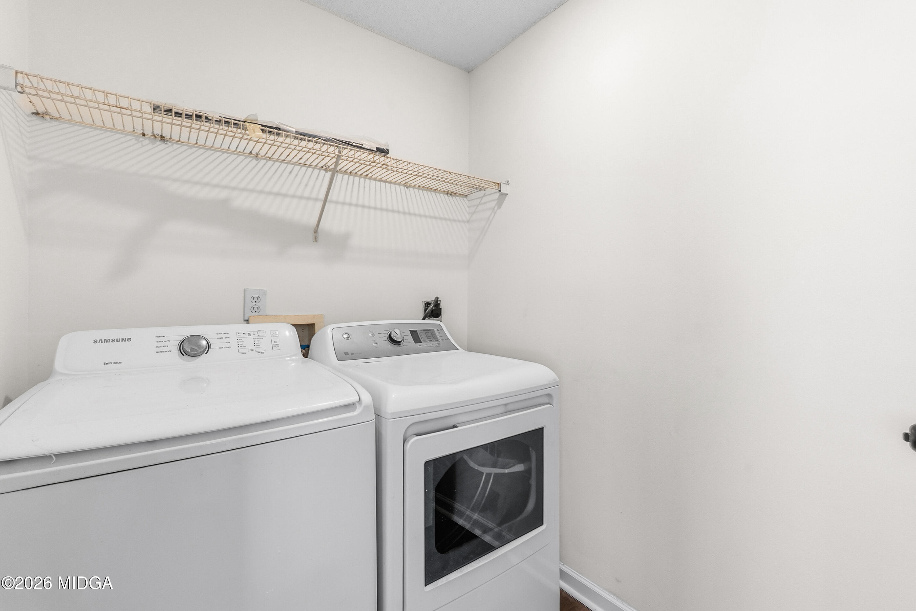 404 Wynfield Lane Bonaire, GA 31005 - Photo 19 of 45 a utility room with dryer and washer