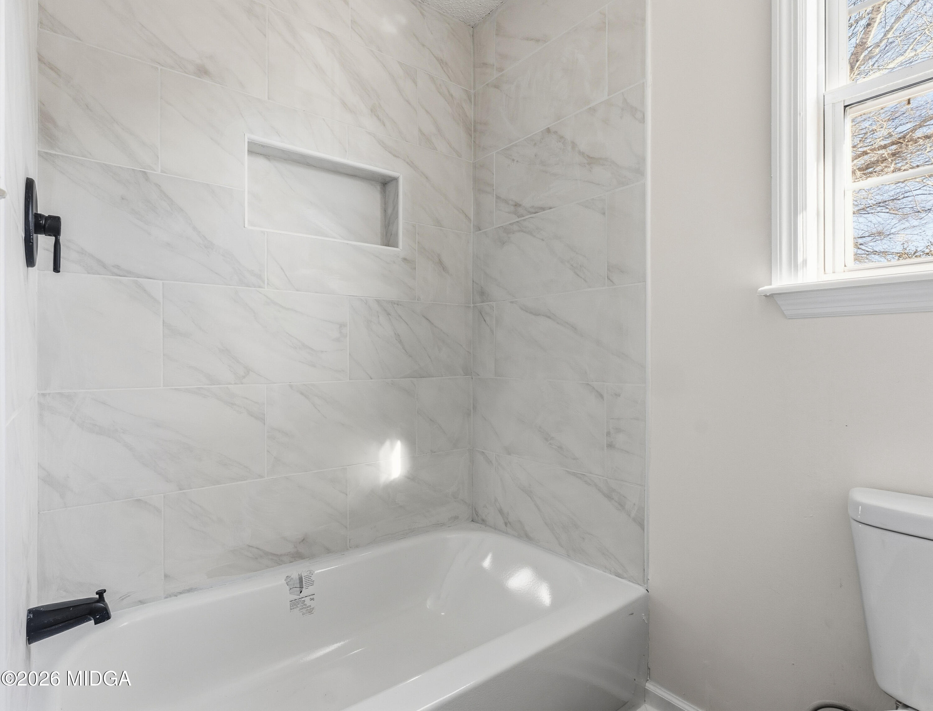 404 Wynfield Lane Bonaire, GA 31005 - Photo 29 of 45 a bathroom with a bathtub and toilet