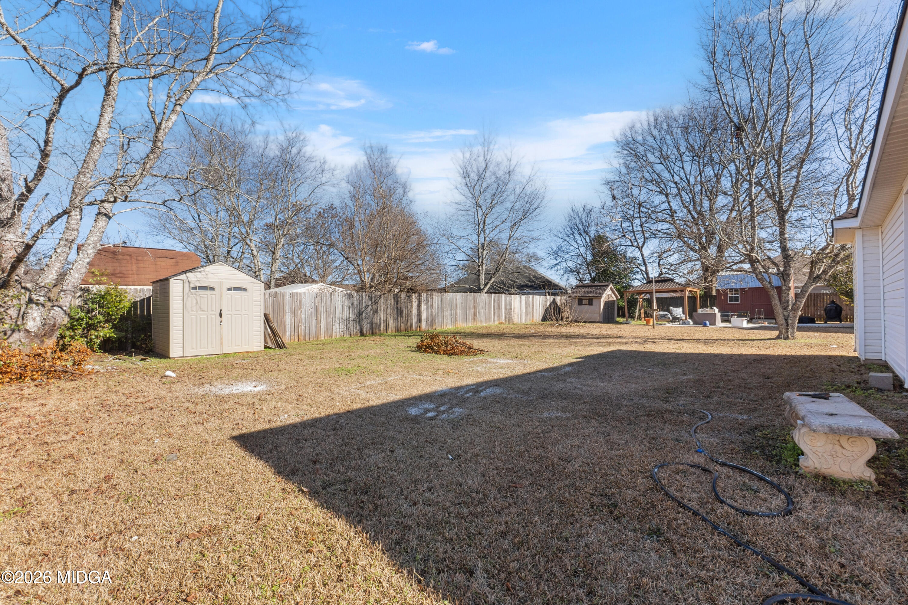 404 Wynfield Lane Bonaire, GA 31005 - Photo 40 of 45 a view of road with large trees