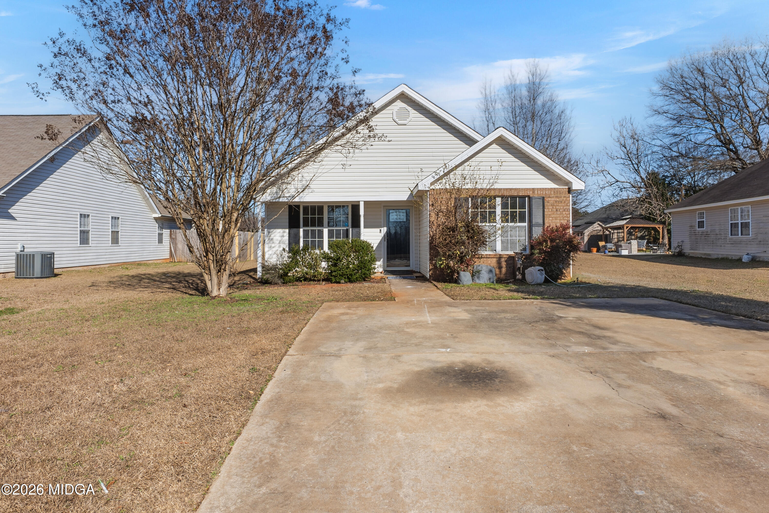 404 Wynfield Lane Bonaire, GA 31005 - Photo 42 of 45 a view of a house with a yard covered in it